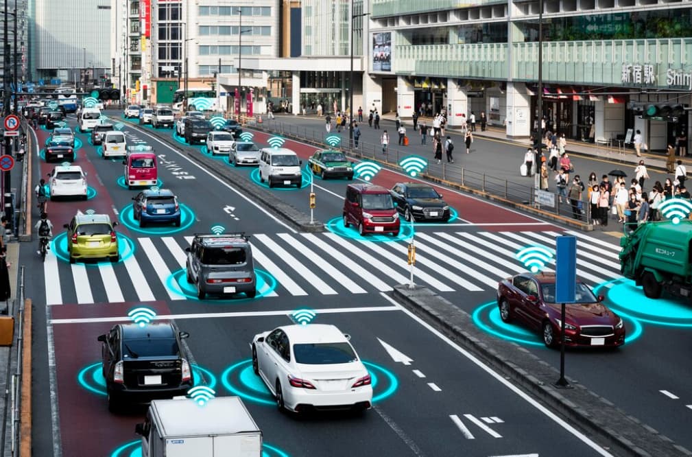 Autonomous cars with connectivity signals on a busy street